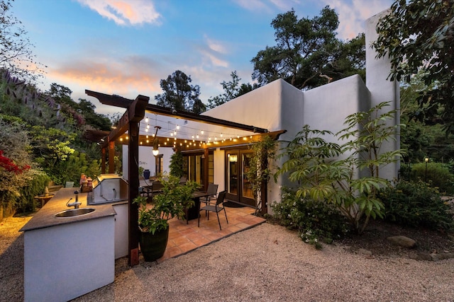 1435 Sycamore Canyon Rd, Santa Barbara, CA 93108 - view of patio with exterior kitchen and a sink
