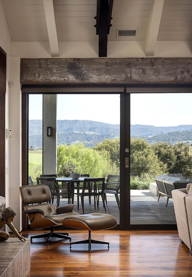 2794 Kara Ln, Solvang, CA 93463 - doorway featuring visible vents, a mountain view, beam ceiling, and wood finished floors