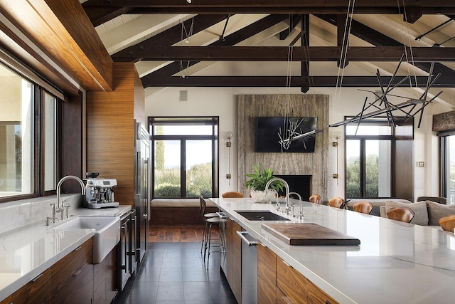 2794 Kara Ln, Solvang, CA 93463 - kitchen with open floor plan, a sink, and light countertops