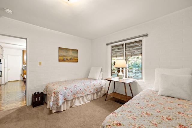 bedroom with visible vents and carpet