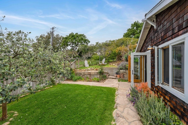 view of yard with fence