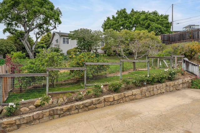 view of yard with a gate and fence