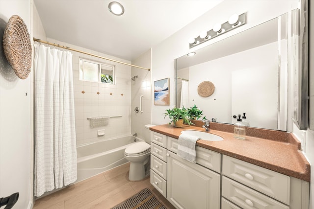 full bathroom with toilet, vanity, and shower / bath combination with curtain