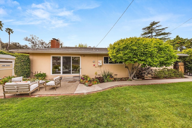 back of house with stucco siding, a chimney, a patio area, an outdoor hangout area, and a lawn