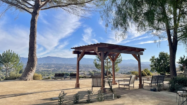 2852 Tapadero Rd, Solvang, CA 93463 - surrounding community with a pergola and a mountain view
