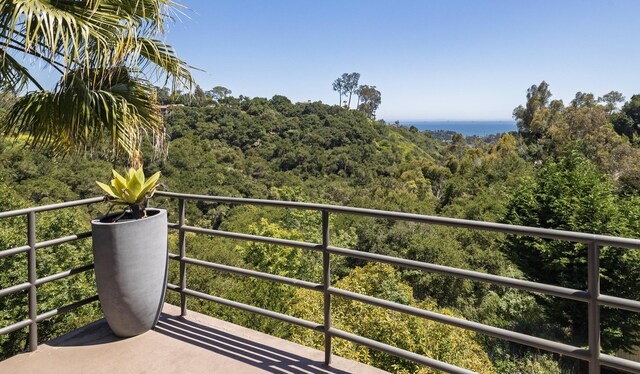 1776 Eucalyptus Hill Rd, Santa Barbara, CA 93103 - balcony with a water view and a wooded view