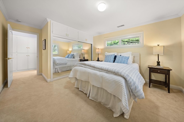 bedroom with baseboards, ornamental molding, visible vents, and light colored carpet