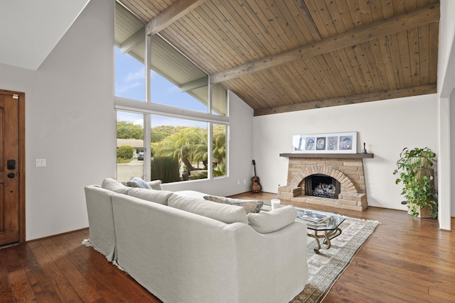living area with high vaulted ceiling, hardwood / wood-style floors, a fireplace with raised hearth, wood ceiling, and beam ceiling