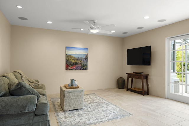tiled living area featuring a ceiling fan and recessed lighting