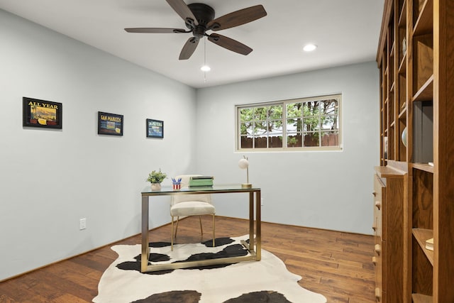office featuring a ceiling fan, wood finished floors, and recessed lighting