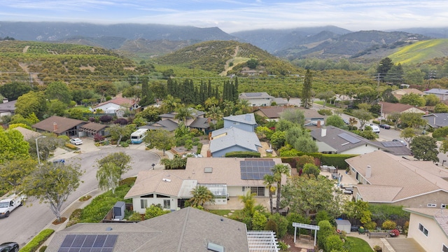 bird's eye view with a mountain view and a residential view