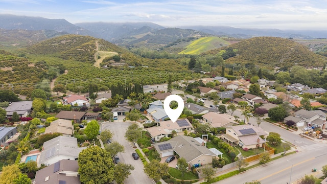 birds eye view of property featuring a residential view and a mountain view