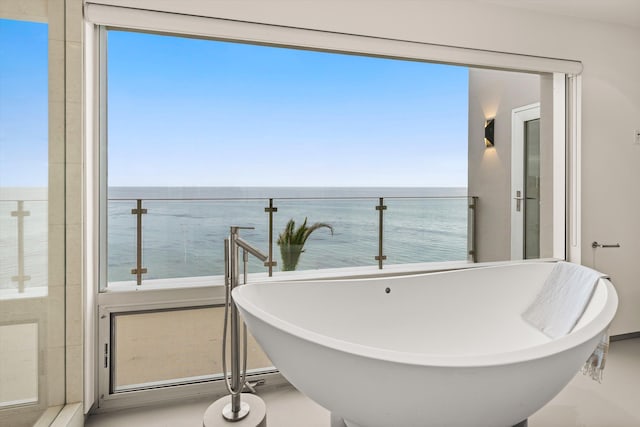 balcony featuring a water view