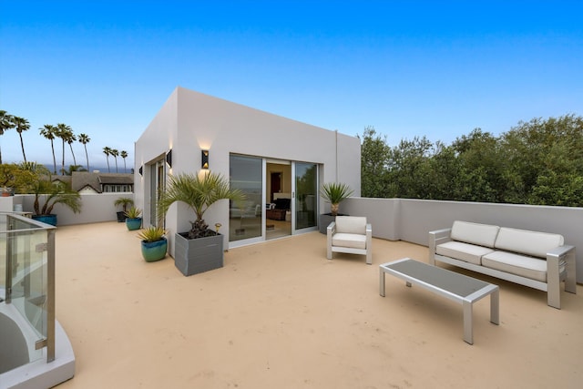 view of patio with fence and an outdoor living space