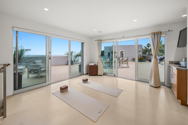 interior space with recessed lighting and a healthy amount of sunlight