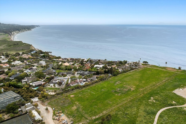 birds eye view of property featuring a water view and a residential view