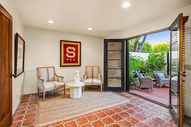 living area with recessed lighting