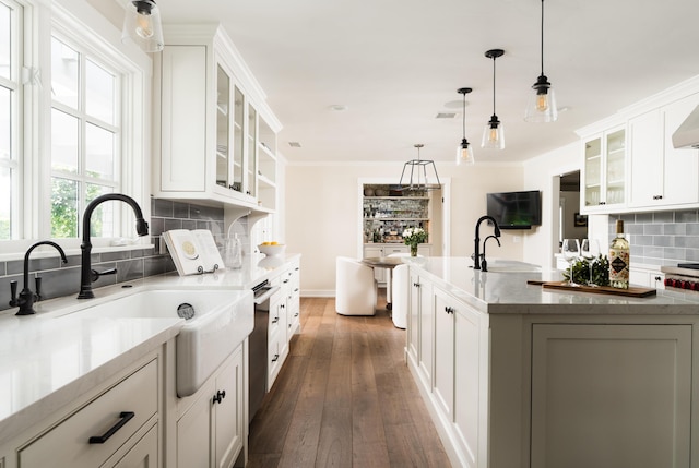 2749 Sycamore Canyon Rd, Santa Barbara, CA 93108 - kitchen with a sink, dark wood finished floors, white cabinets, and tasteful backsplash
