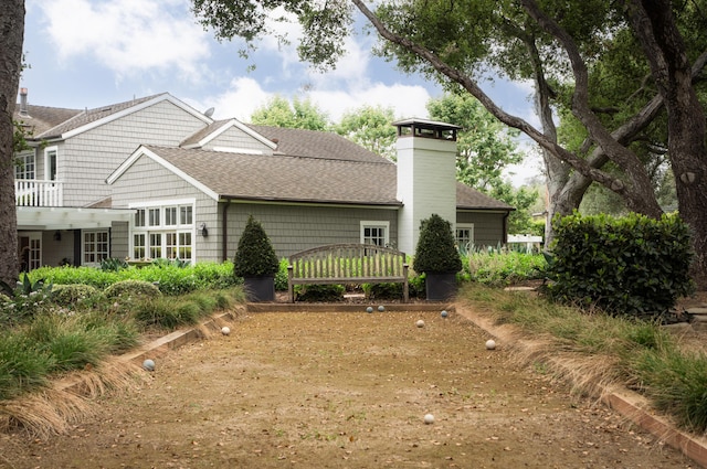 2749 Sycamore Canyon Rd, Santa Barbara, CA 93108 - rear view of property with a shingled roof and a chimney