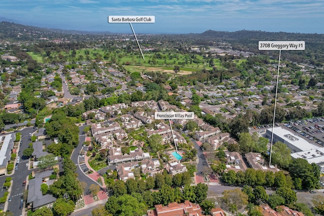 birds eye view of property with a residential view