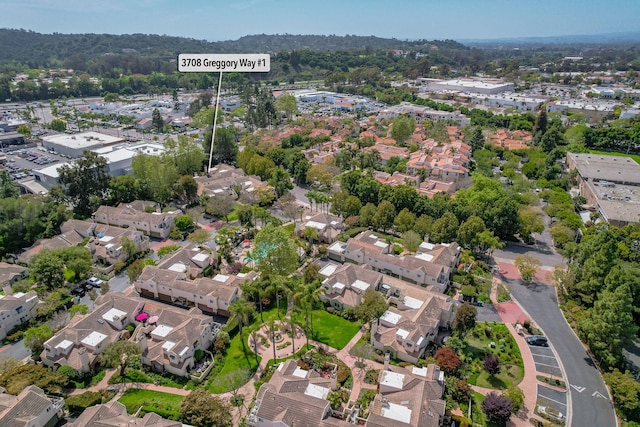 birds eye view of property with a residential view