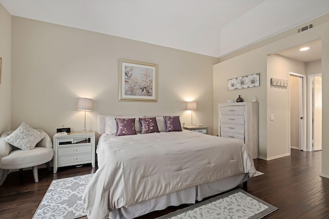bedroom featuring dark wood-style floors, baseboards, visible vents, and recessed lighting