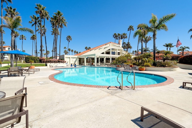 pool with a patio area
