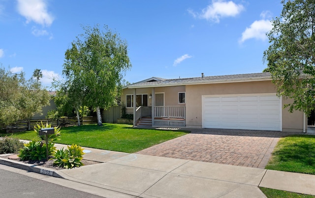 ranch-style home with covered porch, fence, a garage, stucco siding, and decorative driveway