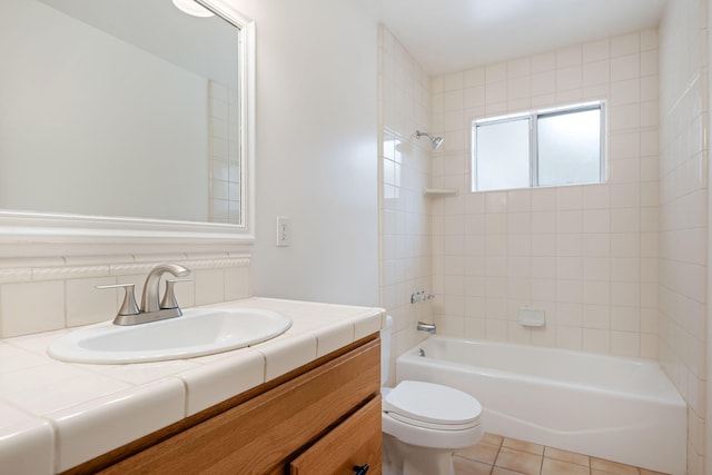 full bathroom with toilet, vanity, and shower / bath combination