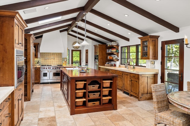 kitchen featuring open shelves, brown cabinets, range with two ovens, a sink, and wood counters
