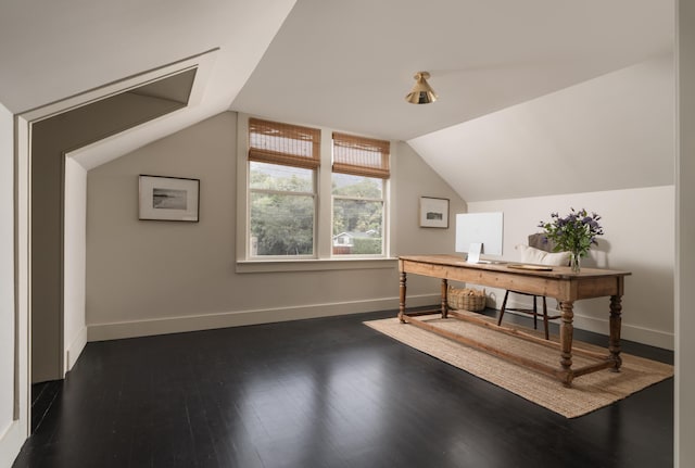 office area featuring baseboards, dark wood finished floors, and lofted ceiling
