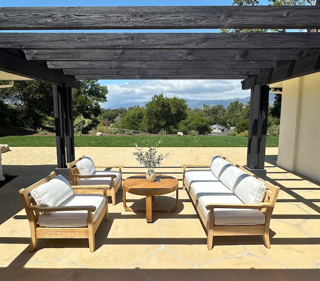 view of patio featuring a pergola and outdoor lounge area