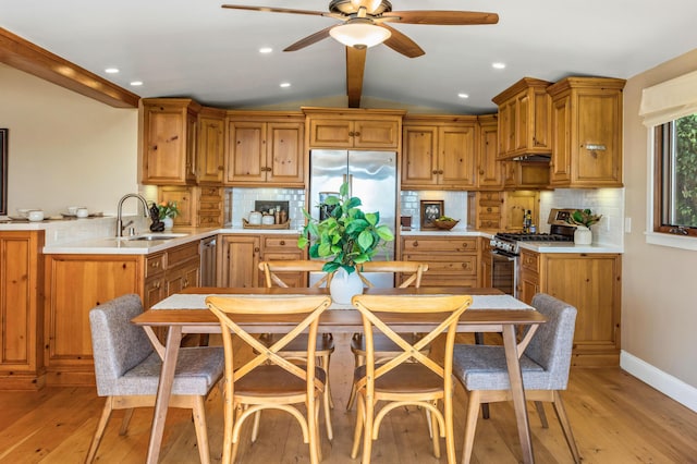 2760 Williams Way, Santa Barbara, CA 93105 - kitchen with light countertops, stainless steel appliances, a ceiling fan, and light wood-style floors