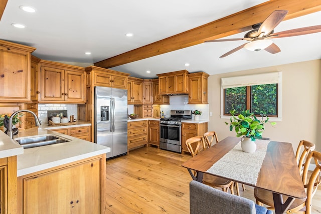 2760 Williams Way, Santa Barbara, CA 93105 - kitchen featuring appliances with stainless steel finishes, beam ceiling, a sink, light countertops, and recessed lighting