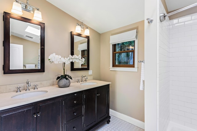 2760 Williams Way, Santa Barbara, CA 93105 - full bath with baseboards, visible vents, a tile shower, and a sink
