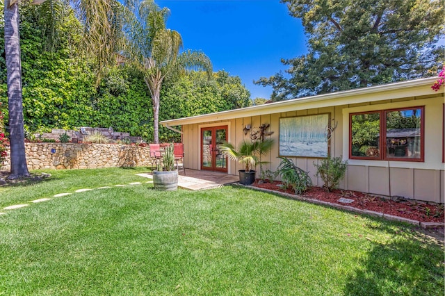 2760 Williams Way, Santa Barbara, CA 93105 - view of front of home featuring board and batten siding, french doors, and a front yard