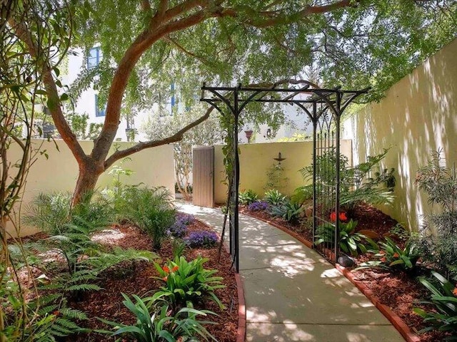 view of patio / terrace featuring fence