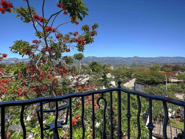 balcony featuring a mountain view