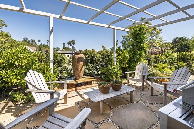 view of patio / terrace featuring a pergola