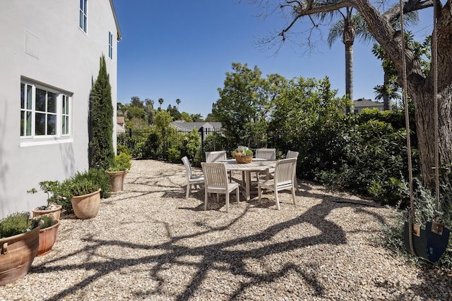 view of patio / terrace with fence and outdoor dining space