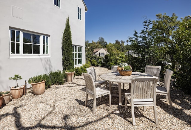 view of patio featuring outdoor dining space
