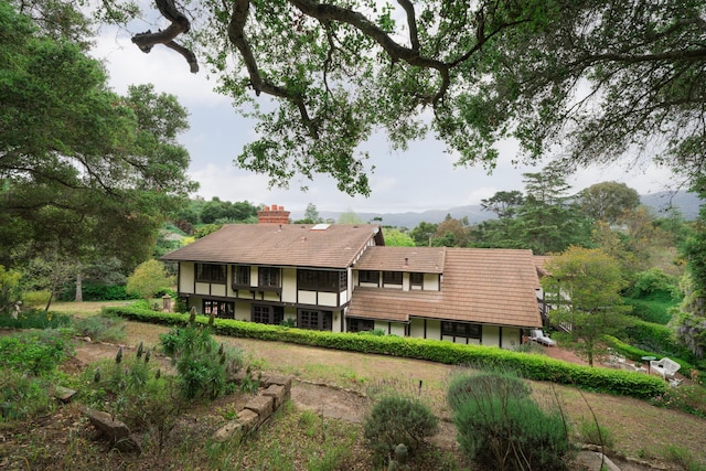 rear view of house with a chimney