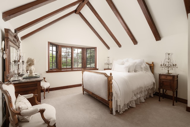 bedroom featuring light colored carpet, baseboards, and vaulted ceiling with beams