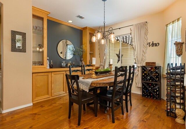 dining room featuring baseboards, recessed lighting, an inviting chandelier, dark wood-style floors, and visible vents