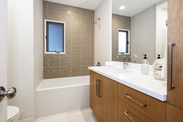 bathroom with toilet, tile patterned floors, shower / bath combination, and vanity