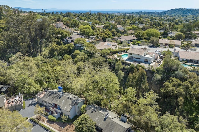 bird's eye view featuring a forest view