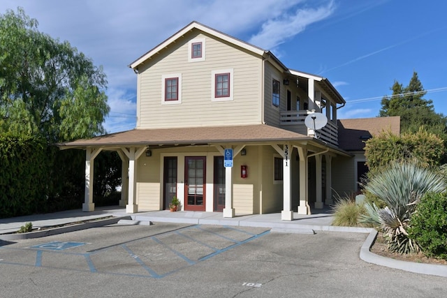 3513-3515 Numancia St, Santa Ynez, CA 93460 - view of front facade with covered porch, a balcony, and a shingled roof