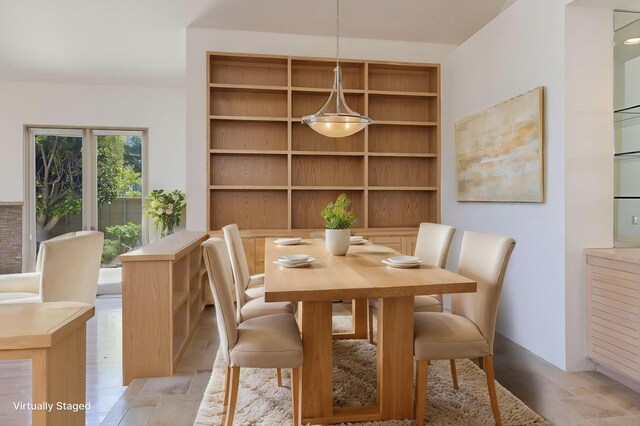 dining area with built in shelves