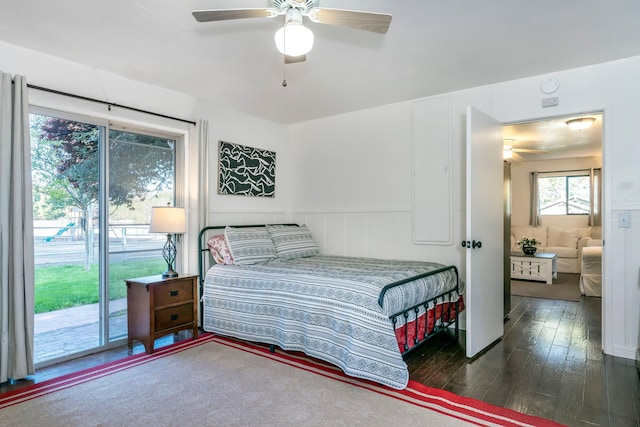 bedroom with a ceiling fan, access to outside, and wood-type flooring