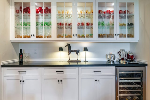 bar with wine cooler and indoor bar